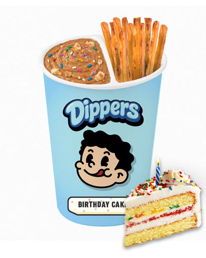 A Dippers branded bucket of fries with a side of cake, shown on a plain white background. The bucket is light blue with the Dippers logo and cartoon character, and a slice of birthday cake with sprinkles is pictured next to it.