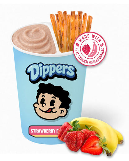 A Dippers Strawberry Fudge cup with a light blue container, chocolate-dusted waffle sticks, strawberries, and bananas on a plain white background. A red circular badge on the upper right says 'Made with Real Strawberries'.